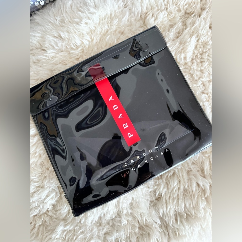 Prada Luna Rossa carbon travel case brand new!